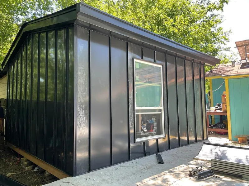 Black standing seam metal wall panels for Roof Inspection in Bellbrook