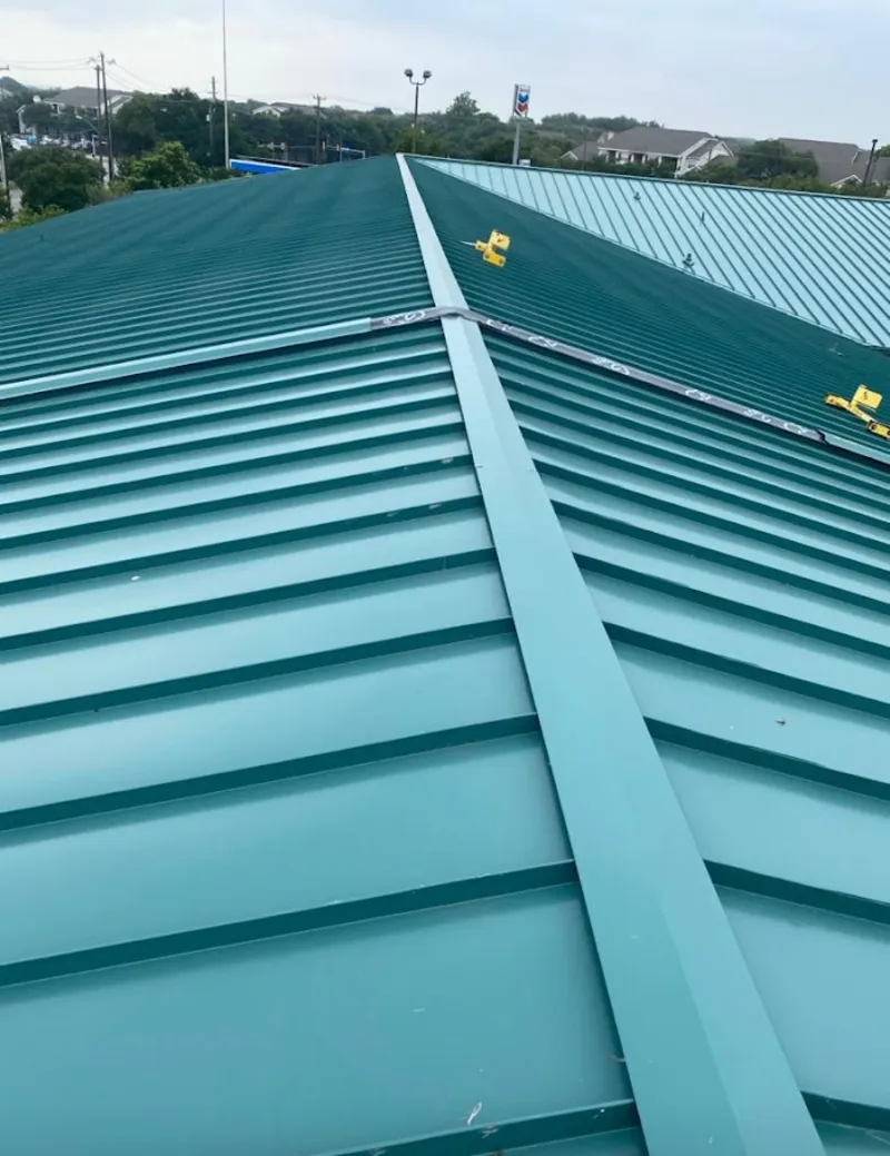 Green commercial metal roof ridge and valley for Metal Roof Repair in Bellbrook